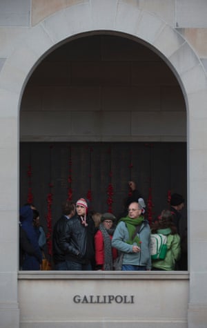 People file past the roll of honour after the Anzac dawn service at The Australian War memorial in Canberra
