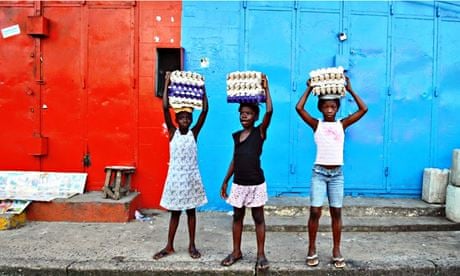 Girls sell eggs in Monrovia, Liberia, West Africa