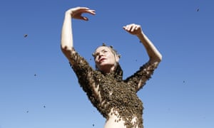 Artist Sara Mapelli dances in a  bee-blouse