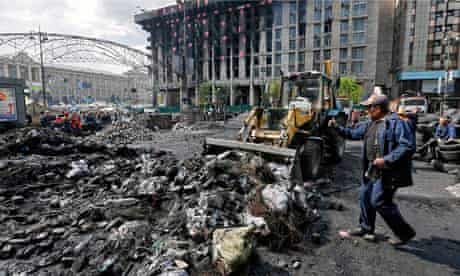 Workers are already removing barricades and cleaning up Independence Square in Kiev