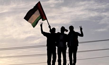 People celebrate in Gaza City after an announcement of a reconciliation between Hamas and Fatah.