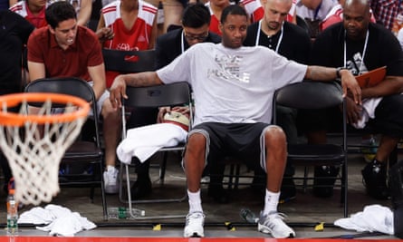 Tracy McGrady sits courtside as he attends the 2023 WNBA All-Star News  Photo - Getty Images