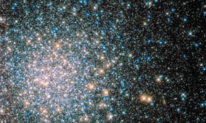A globular star cluster called Messier 5 (M5) containing 100,000 stars or more and packed into a region around 165 light-years in diameter is seen in an image taken by NASA's Hubble Space telescope and released today