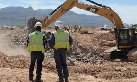 Workers monitor progress at the old Alamogordo landfill in search of buried Atari games in Alamogordo, New Mexico.