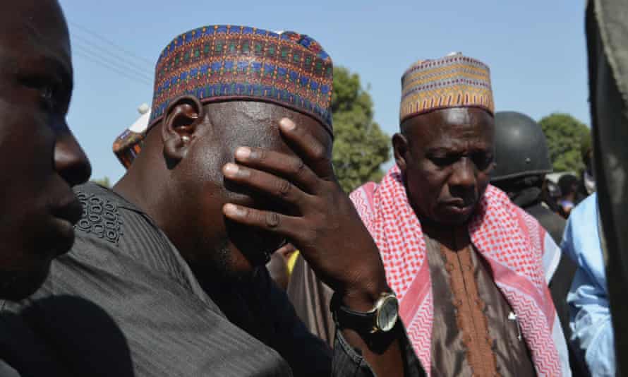A man weeps as he joins parents of kidnapped school girls during a meeting with the Borno State governor in Chibok, Maiduguri on 22 April, 2014.