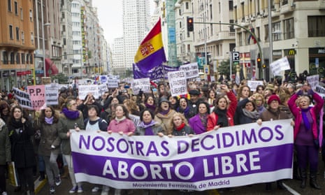 Women protest in Madrid against a draft bill on abortion that would restrict their reproductive rights.
