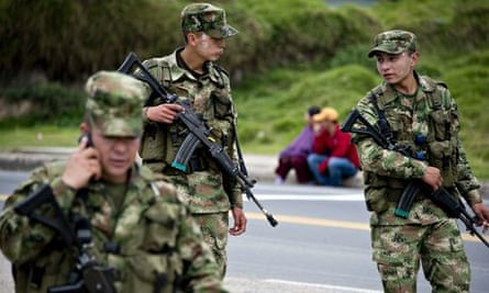 Colombian soldiers patrol the Bogota-Tunja highway
