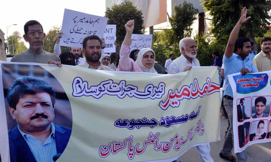 Activists from the Defence of Human Rights Pakistan organisation protest in Islamabad against the shooting of journalist Hamid Mir. Mir, who hosts a prime-time current affairs talk show on the Geo News channel, survived being shot three times on April 19