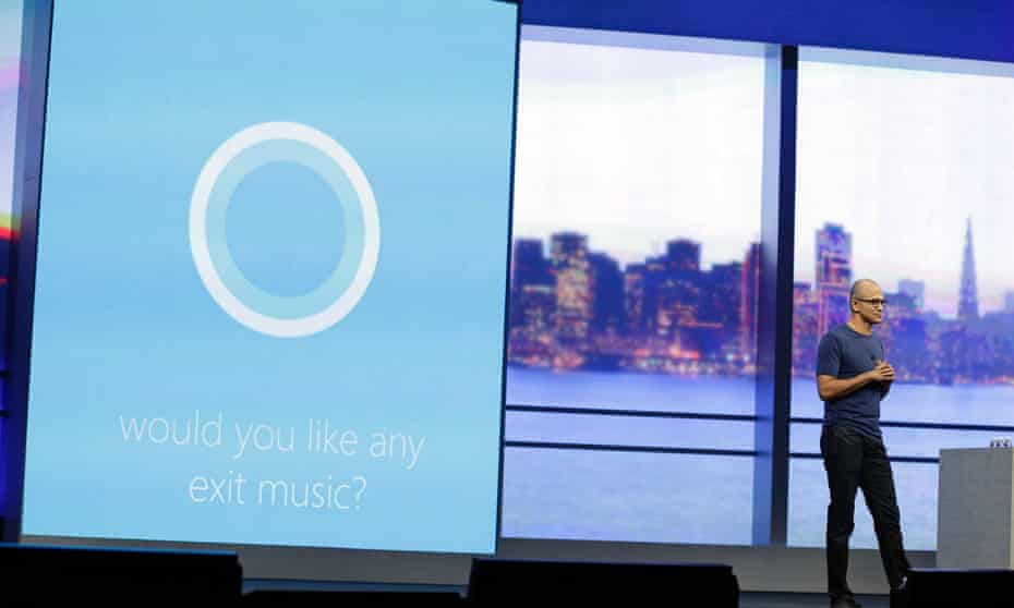 Microsoft CEO Satya Nadella carries on a conversation with the new personal assistant Cortana at the end of his keynote address to the Build Conference Wednesday, April 2, 2014, in San Francisco.