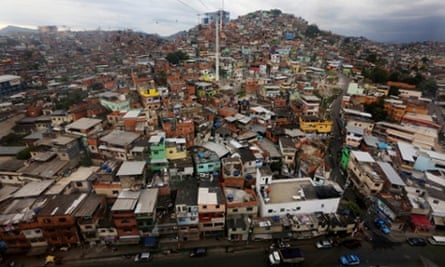 The Teleferico cable car system soars over the Alemão favela.