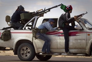 20 Photos: Libyan rebels retreat as mortars from Gaddafi's forces are fired at them
