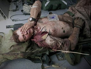 20 Photos: United States Marine Corporal on a medevac helicopter in Afghanistan