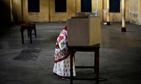 A woman casts her vote in Dibrugarh, Assam, in the Indian election.