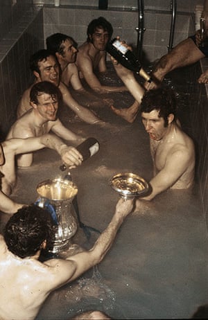 Bath time: Chelsea's players celebrate with champagne in the bath