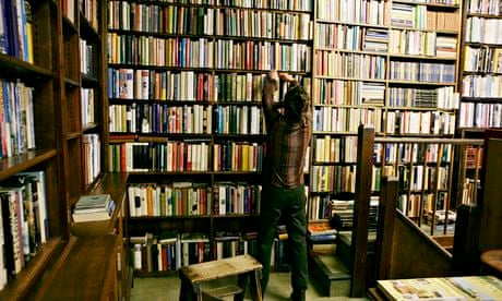 A man looking at books