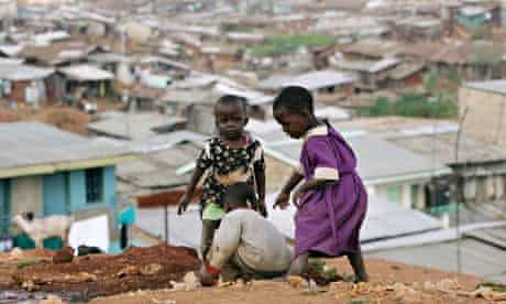 Children play in a Kenya slum