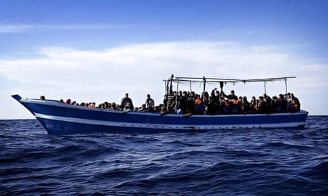 Boat carrying migrants off coast of Libya