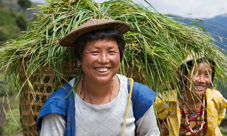 Bhutanese Farmers Carrying Full Baskets
