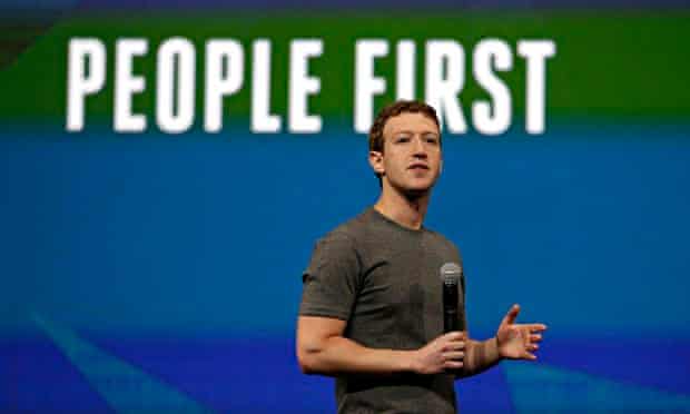 Mark Zuckerberg, microphone in hand, addresses a conference