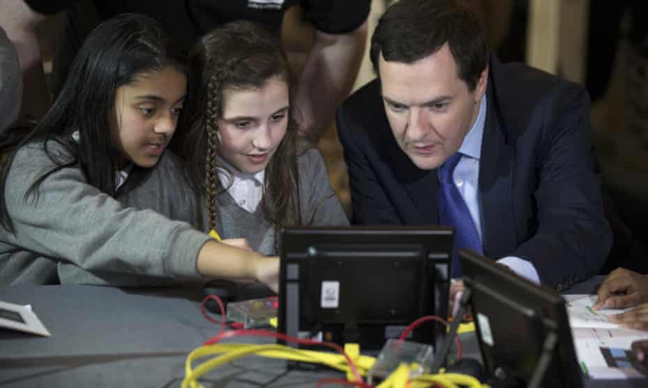 two girls show George Osborne code on a computer