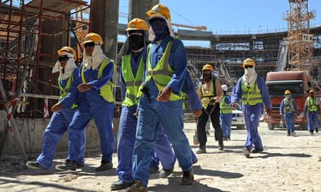 Foreign laborers work in Qatar