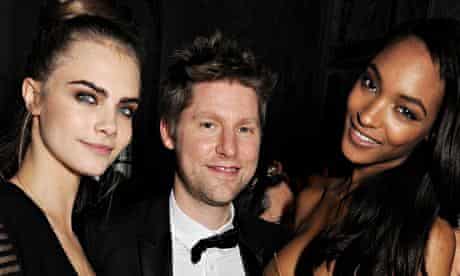 Christopher Bailey with models Cara Delevingne and Jourdan Dunn