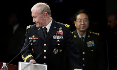 Chairman of the US joint chiefs of staff, General Martin Dempsey, arrives for press briefing with the Chinese army chief General Fang Fenghui