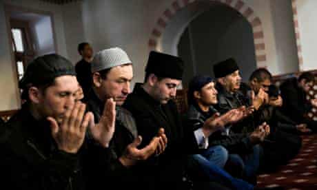 Tatar men pray in the Kebir-Dzhami mosque in Simferopol, Crimea