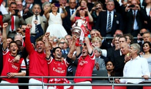 fa cup final : Thomas Vermaelen lifts the trophy