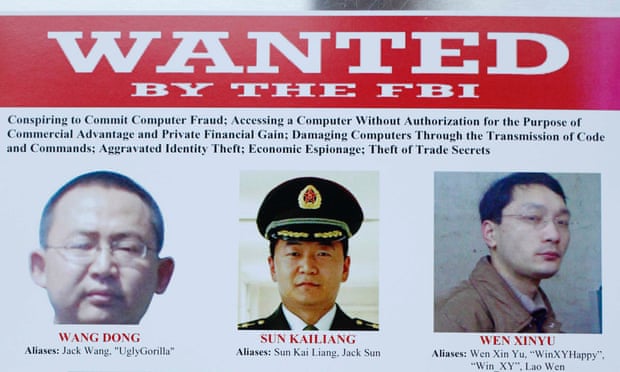 Three of the five officials on an FBI 'Wanted' poster.