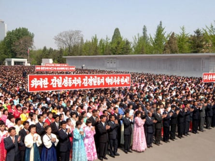 A picture release by KCNA on 02 May 2014 shows North Korean workers attend a rally in Pyongyang, to celebrate the May Day holiday.