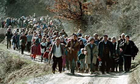 Ethnic Albanian refugees flee their homes near Kacanik, in Kosovo in 1999. 