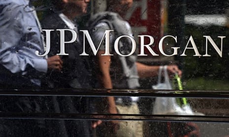 (FILES) People walk by JP Morgan Chase &