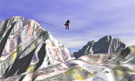 Businessman crossing a financial landscape on a tightrope