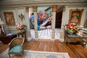 Merlin Crossingham, creative director of Wallace and Gromit, makes some final adjustments to a set on display