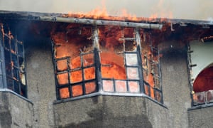 Flames burst through a window at the Glasgow School of Art's Charles Rennie Mackintosh building.