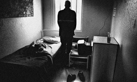 An inmate in his cell at Feltham young offenders institute