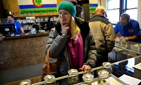An American ponders the choice of marijuana in Denver after Colorado legalised cannabis in January