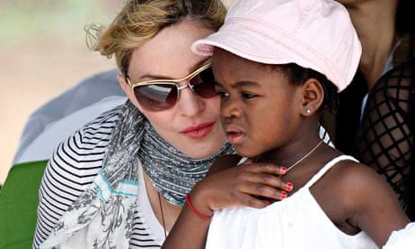 Madonna wears head-to-toe Gucci as she visits Malawi where four of