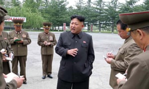 This undated photo released by KCNA on 25 May 2014 shows Kim Jong-Un visiting the Chonma Electrical Machine Plant in North Phyongan Province.