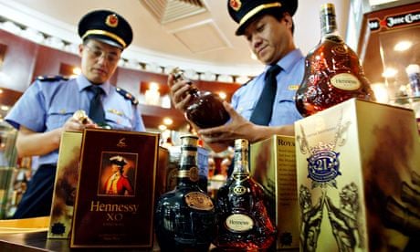 Chinese confiscate fake Remy Martin and Hennessy whiskey.