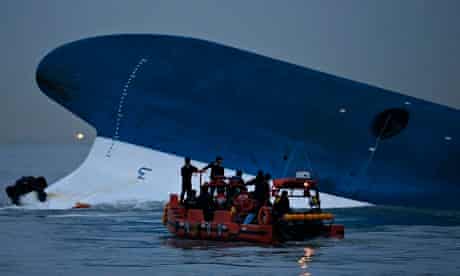 South Korean maritime police search the bow of the Sewol