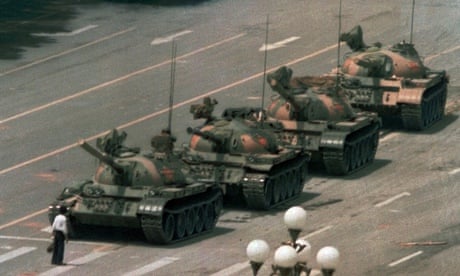 Symbol of defiance … a man blocks a line of tanks in Tiananmen square.
