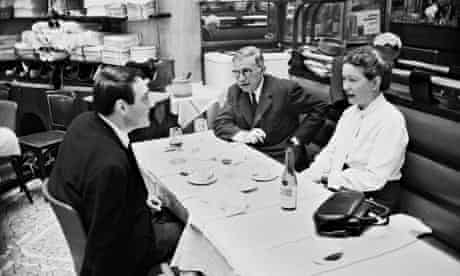 Philosophers Jean-Paul Sartre and Simone De Beauvoir dining with director Claude Lanzmann, 1964