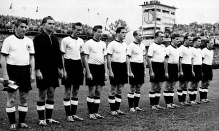 West Germany players line up before the start of the final in Bern.