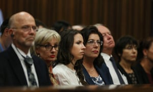 Family members of Oscar Pistorius listen to a witness testifying during his murder trial in the high court in Pretoria on Tuesday.