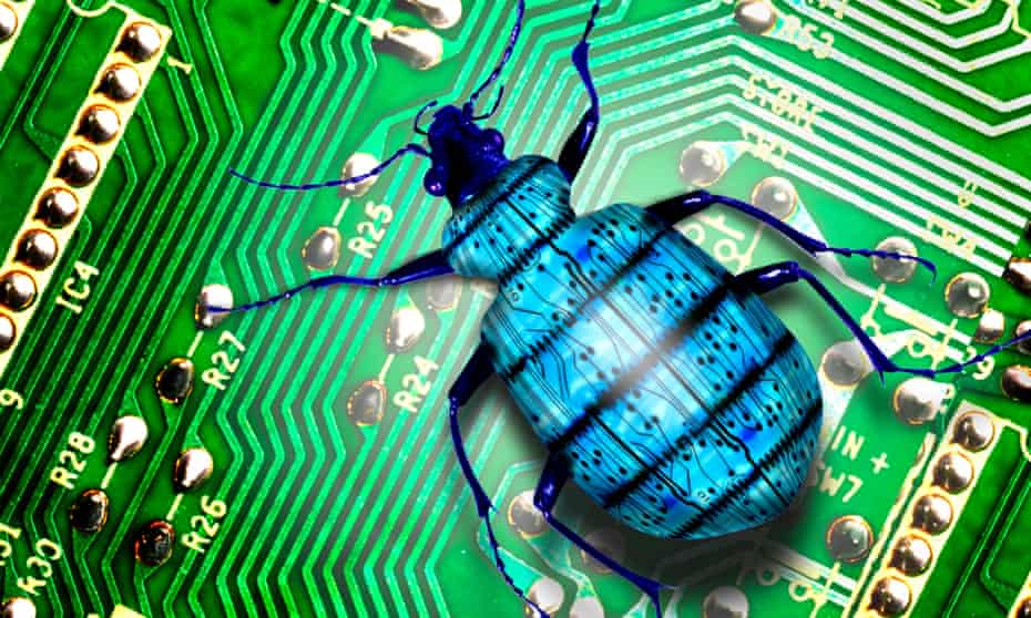 Blue creepy-crawly bug crawls over green electronic circuit