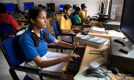 tudents in a computer studies class at school in Hazira, near Surat. Gujarat. India.