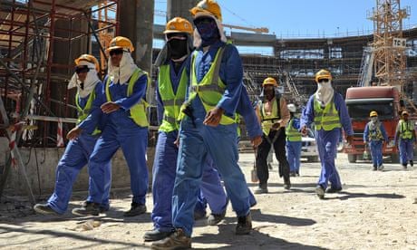 Migrant workers on a construction site in Doha, Qatar