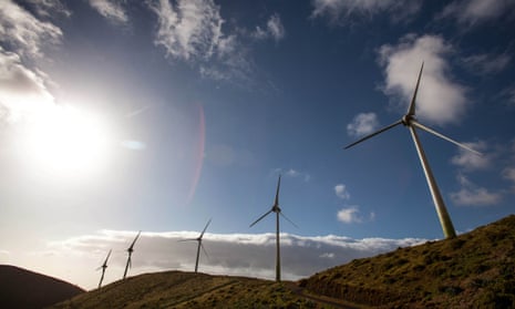 Wind turbines are pictured near the upper reservoir of the Gorona power station Canary island of El Hierro on March 28, 2014